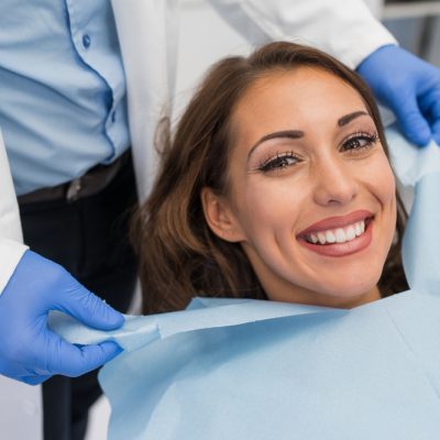 woman smiling in dental chair